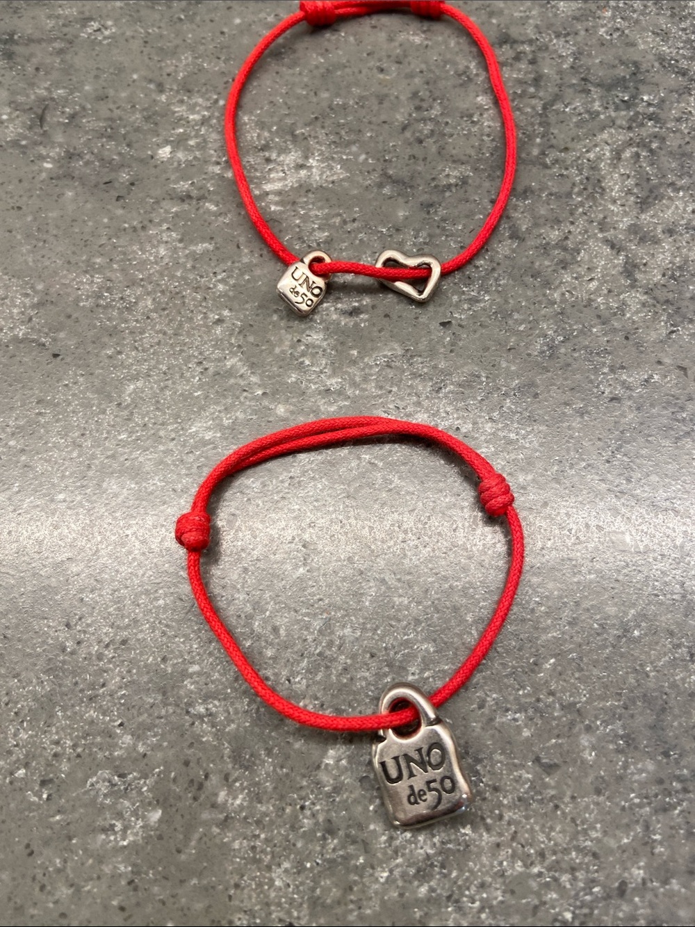 Bundle: UNO de 50 Unisex Red Cord Adjustable Sterling Silver Charm Bracellet